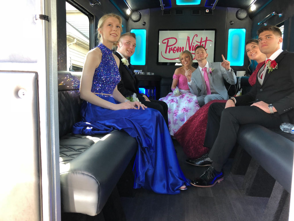 kids in party bus for prom